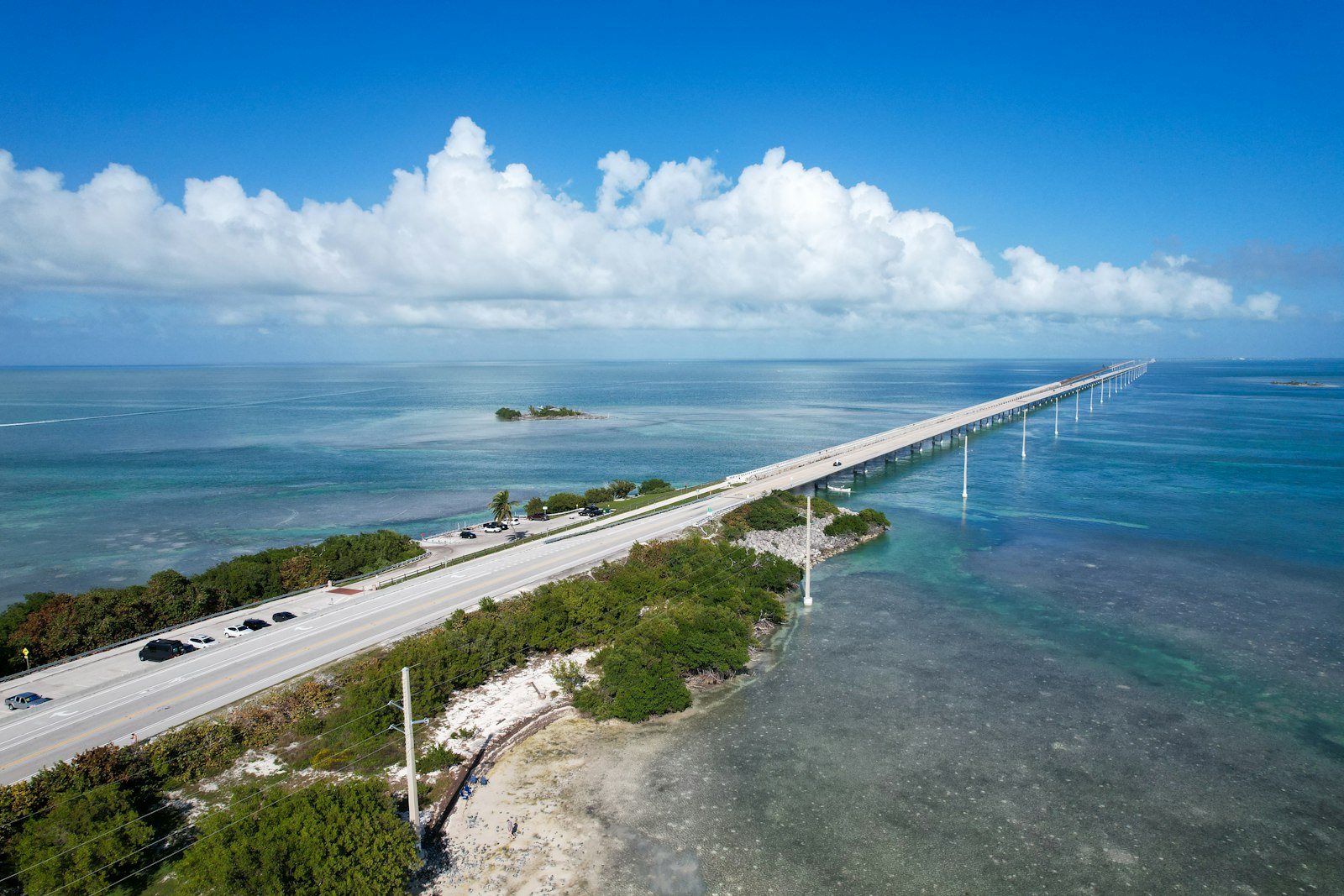 Aerial view of the Seven Mile Bridge stretching across turquoise waters in the Florida Keys